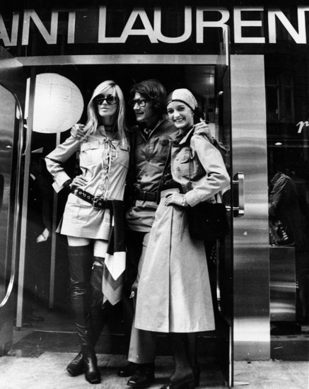 1969: Yves Saint Laurent flanked by muses Betty Catroux and Loulou de la Falaise outside his new shop on New Bond Street, London