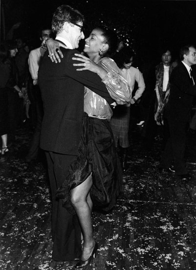 1980: Yves Saint Laurent dancing with Diana Ross at a UNICEF fundraiser in Paris.