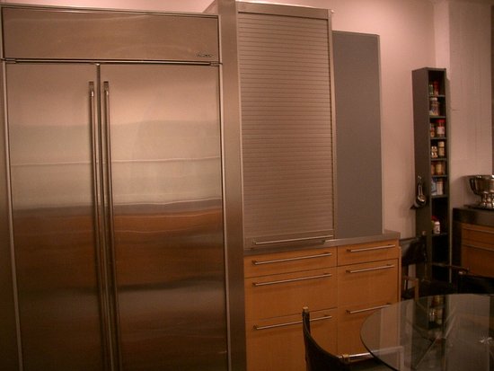 This is a picture of our Dacor fridge and appliance garage. It serves as a pantry too!