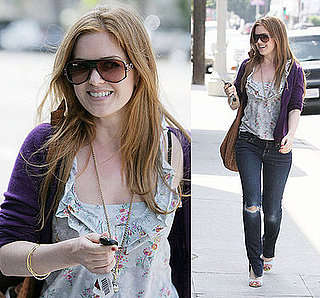 Isla Fisher Hangs Out With Courteney Cox Arquette Wearing Kimchi Floral Top and J Brand Ripped Jeans