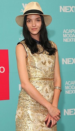Model Mariacarla Boscono Attends Acapulco Moda Nextel 2009 in Fedora and Gold Dress