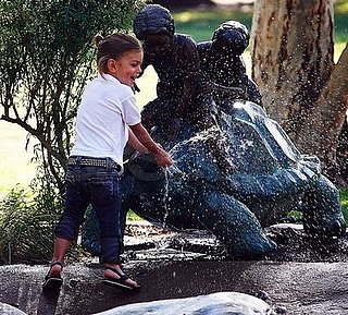 Photos of Kingston Rossdale Playing in a Fountain in a Park in LA