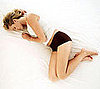 Fit Tip: Stretch in Bed Instead of Snoozing