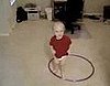 Baby Tries to Hula Hoop