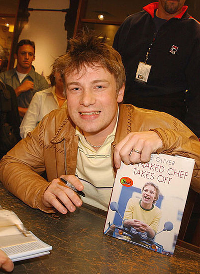 Jamie promoting the launch of his book, The Naked Chef Takes Off, in Toronto in May 2002. Later that year, he opened his first outpost of Fifteen, a restaurant that trains 15 disadvantaged young people to cook, in North London.
Jamie promoting the launch of his book, The Naked Chef Takes Off, in Toronto in May 2002. Later that year, he opened his first outpost of Fifteen, a restaurant that trains 15 disadvantaged young people to cook, in North London.