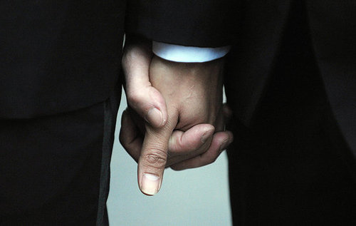 Should Federal Workers Get Benefits For Same-Sex Partners?