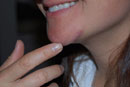 Baby Sucks Mom's Chin