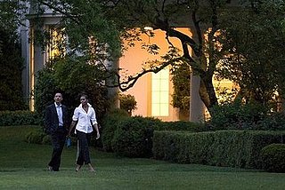 Pictures of Barack and Michelle Obama Walking on White House South Lawn