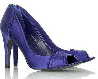 Guess Who Designed These Sexy Satin Pumps?