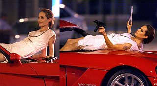 Angelina's Got Guns And She Knows How To Use Them