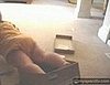 Baby Menaced by Box