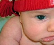 Cute Baby Pouts in Christmas Beanie