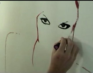 Gwen Stefani Gets Painted... With Lipstick