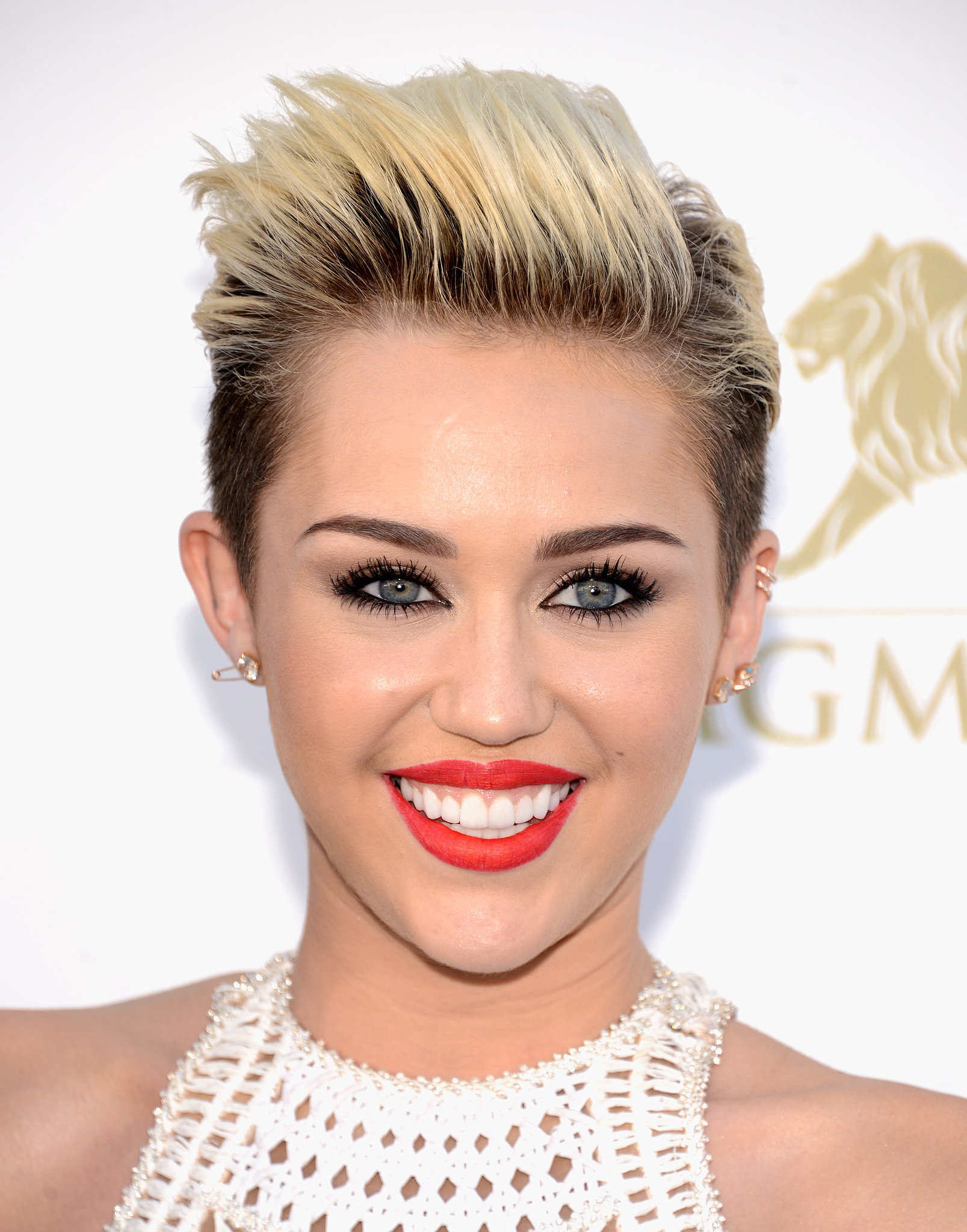 Styling her rocker hair in a slicked-back pompadour, Miley Cyrus | Get ...